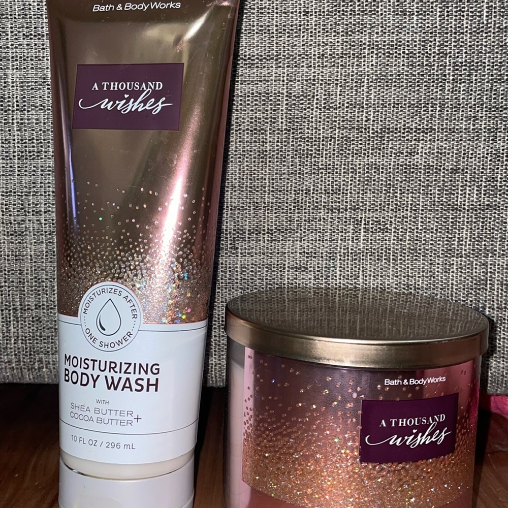A thousand wishes candle and moisturizing body wash bundle